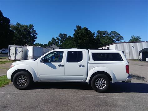 In stock and ready for pickup near you. . Nissan frontier crew cab camper shell